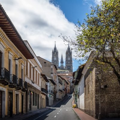 Street of Quito and Basilica del Voto Nacional - Quito, Ecuador